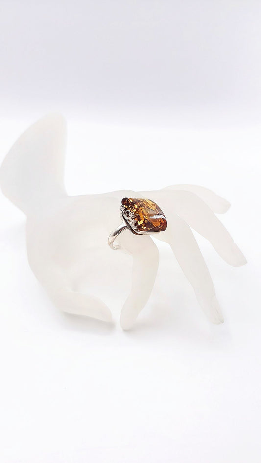 Adjustable 925 silver ring with natural amber