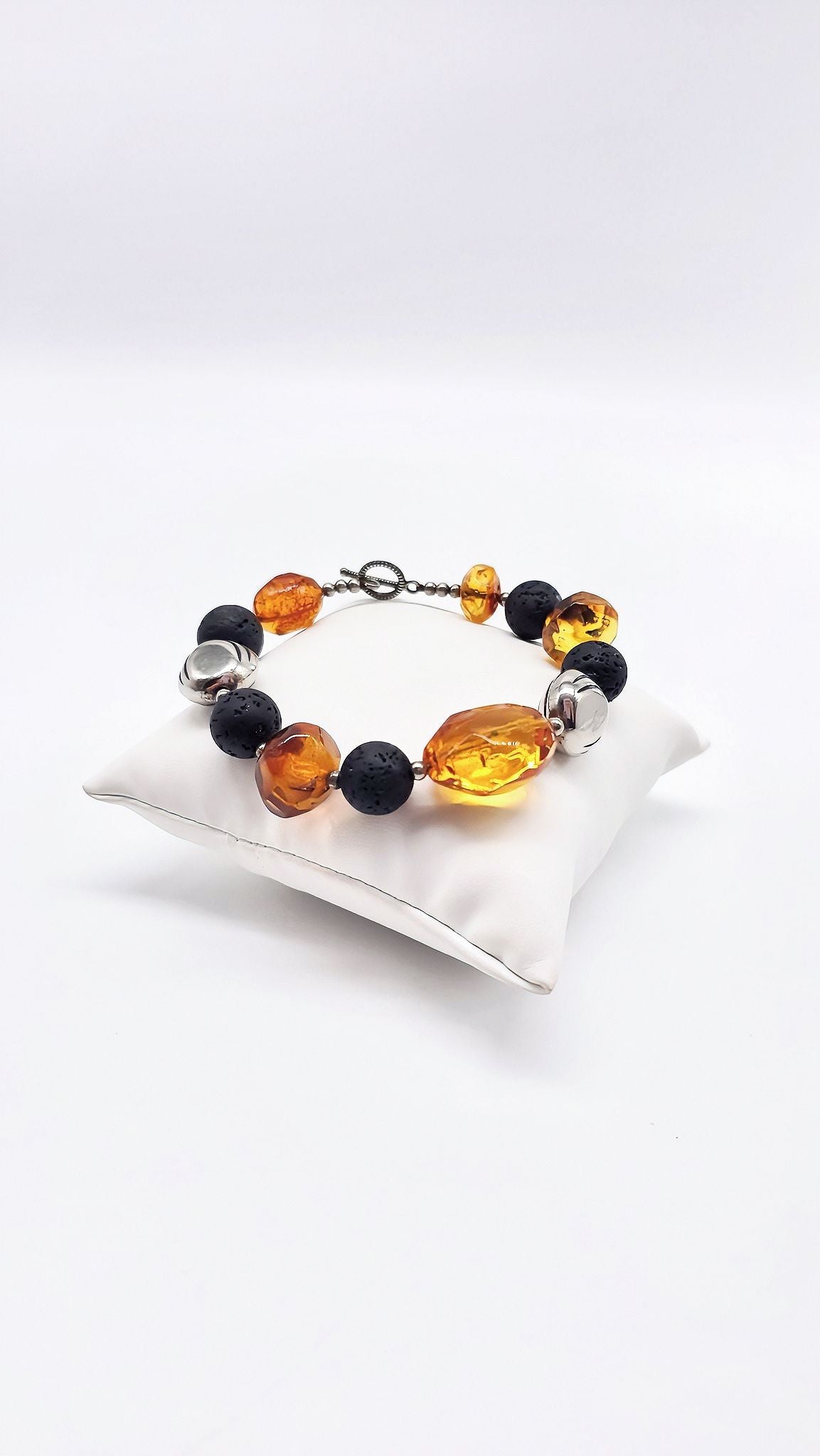Exclusive amber bracelet with lava stone & silver
