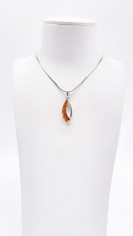 Women's pendant with orange amber & silver