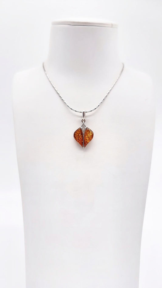 Exclusive ladies' pendant with orange amber & silver