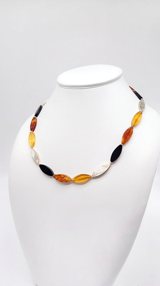 Designer necklace made of genuine amber and sterling silver