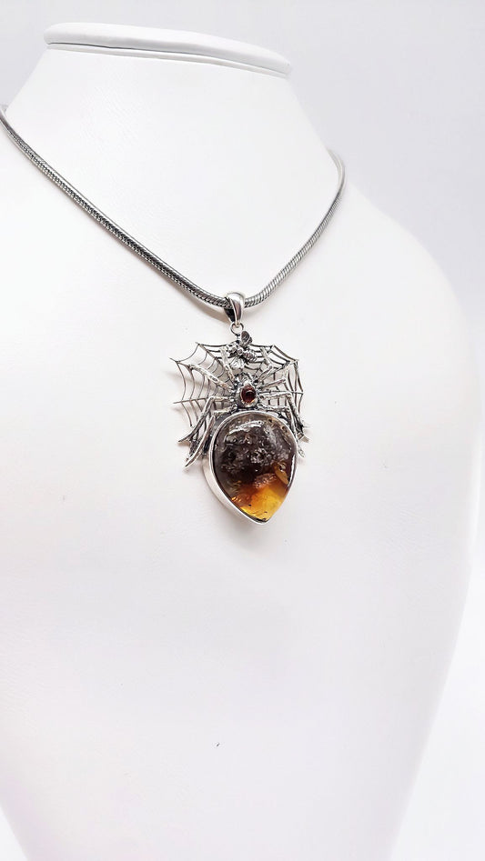 Detailed spider pendant with genuine amber