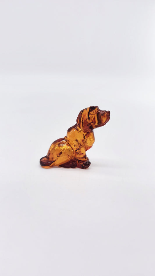 Hand-carved amber dog – symbol of loyalty and protection