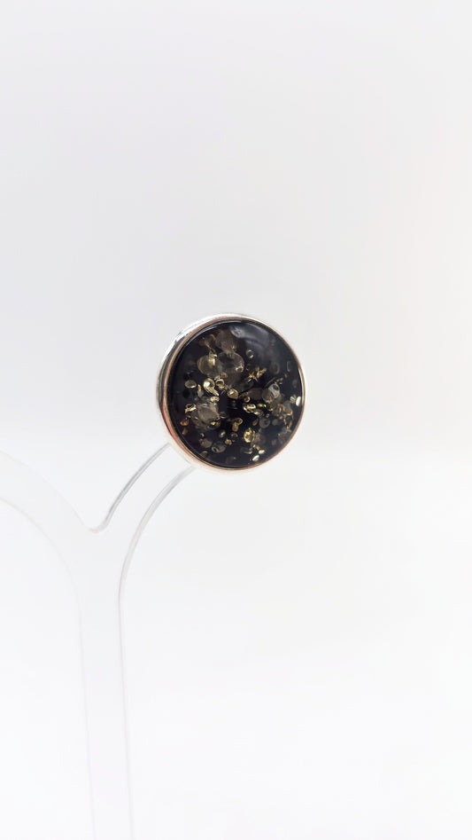Handmade silver clip earrings with rare amber