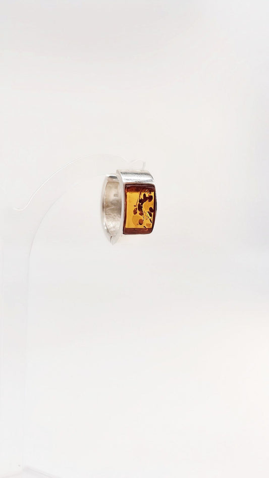 Earrings with honey-colored amber