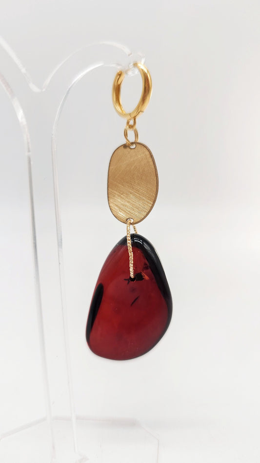 Designer earrings with red natural amber