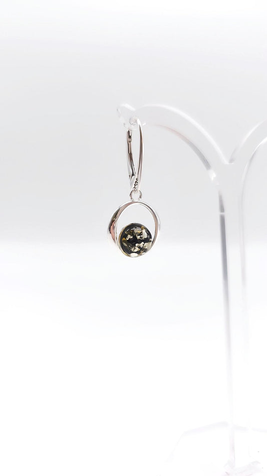 Silver earrings with green amber