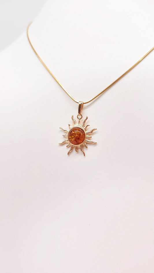 Sun motif pendant for women made of gold-plated silver