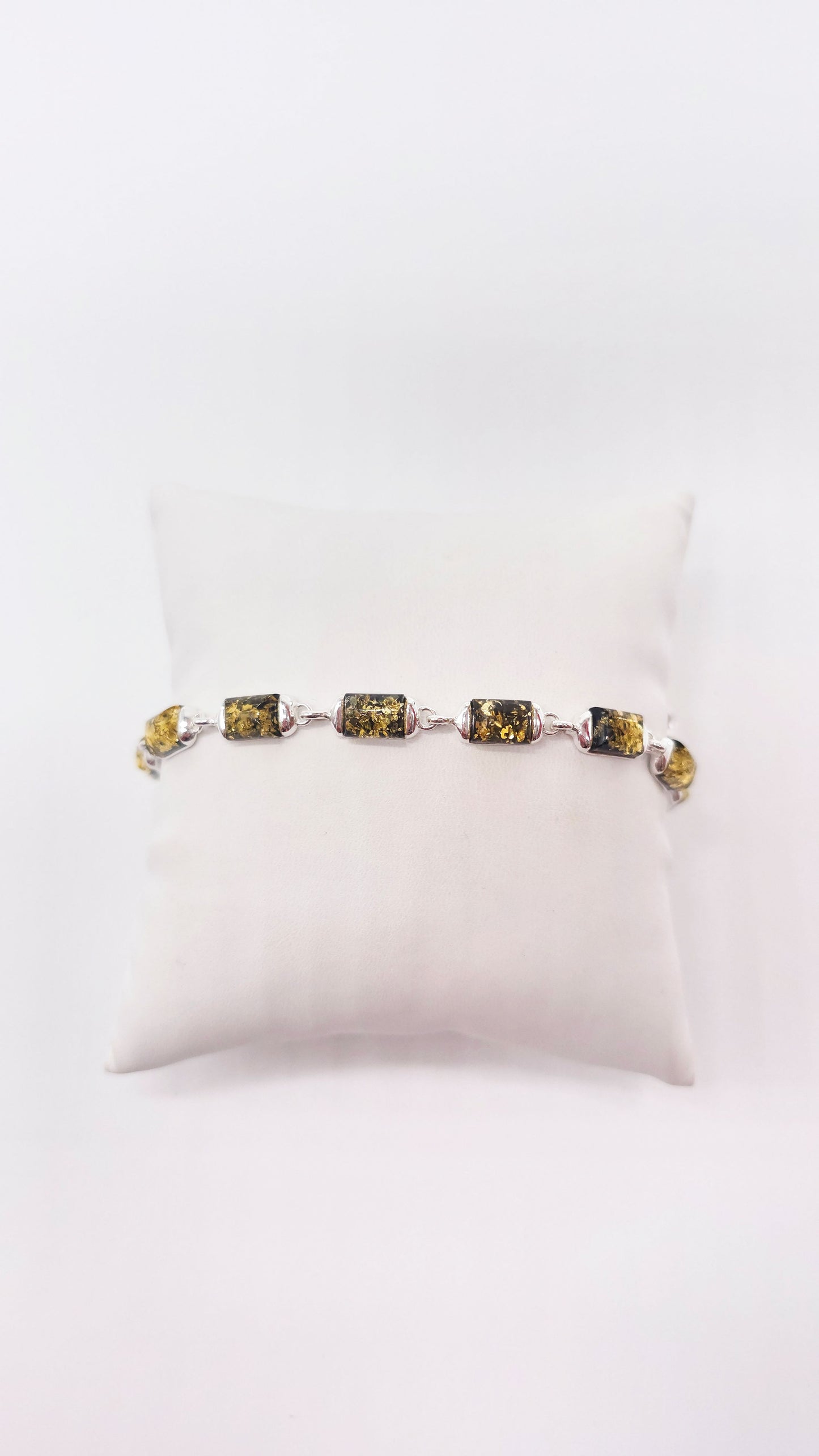 Classic bracelet with green amber for women