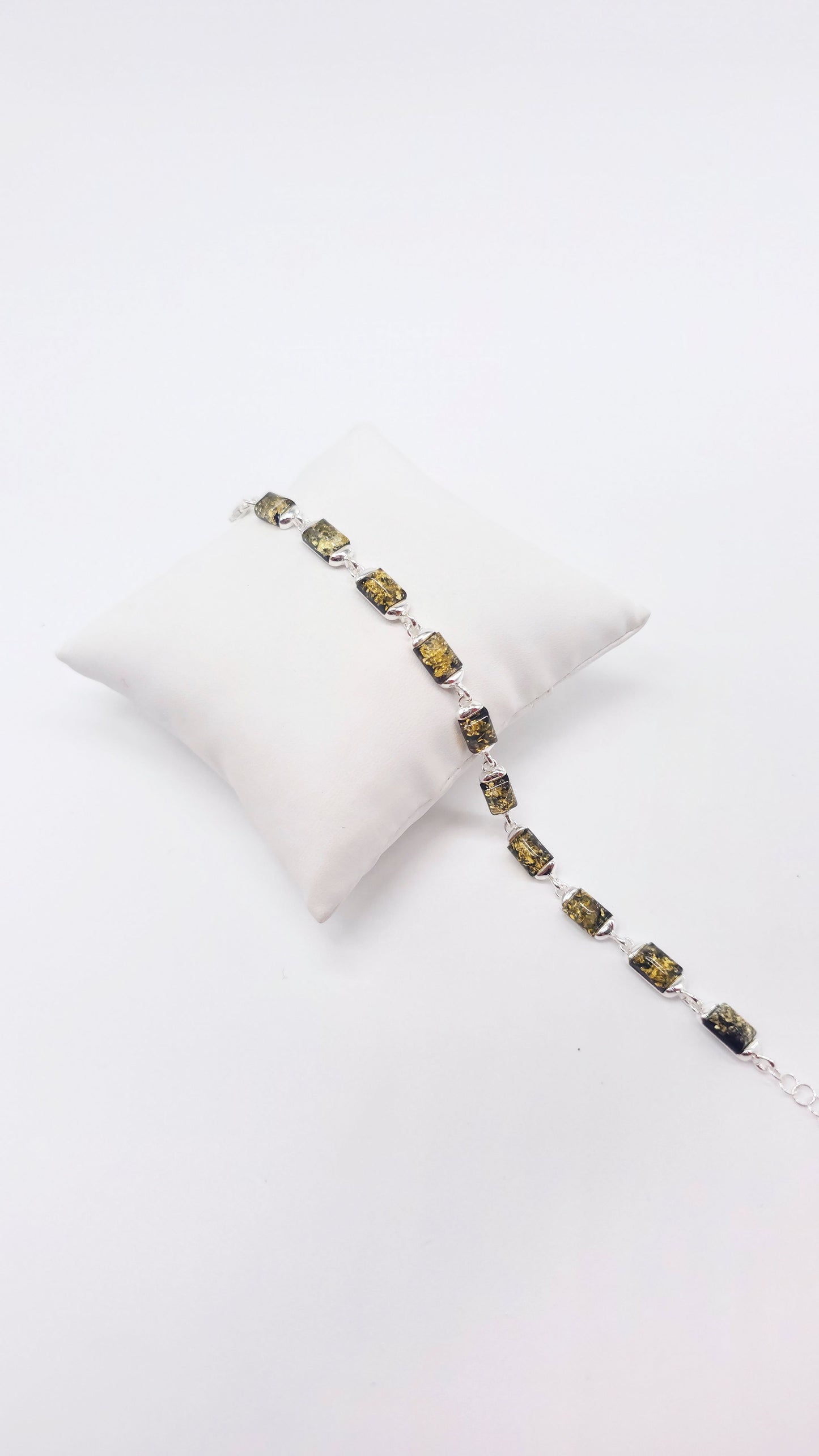 Classic bracelet with green amber for women