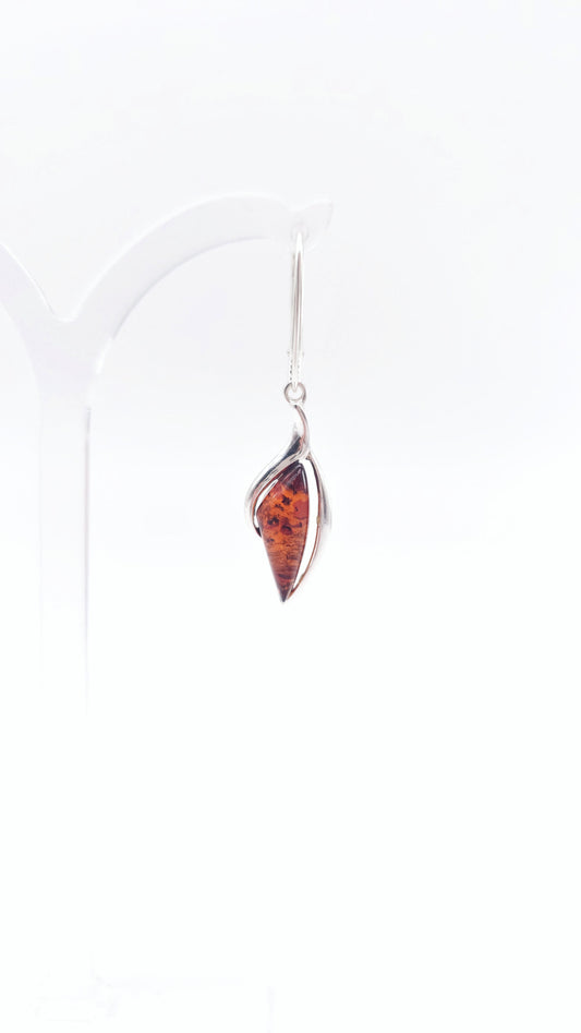 Filigree silver earrings with drop-shaped amber