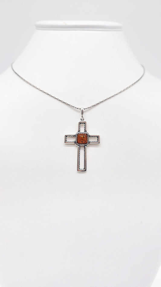 Silver cross pendant with genuine amber