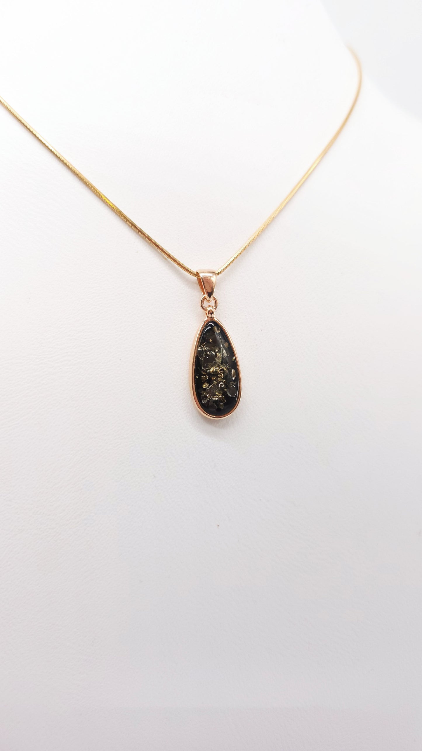 Set made of gold-plated silver with natural amber