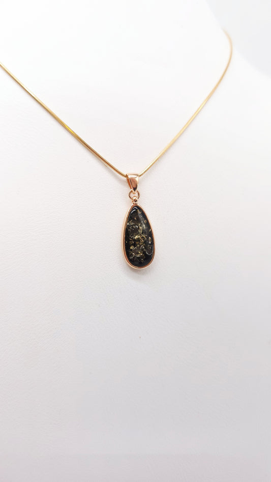 Set made of gold-plated silver with natural amber