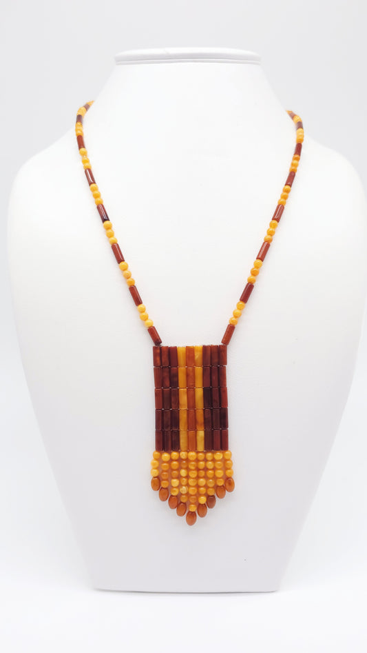 Artistic pendant made of amber