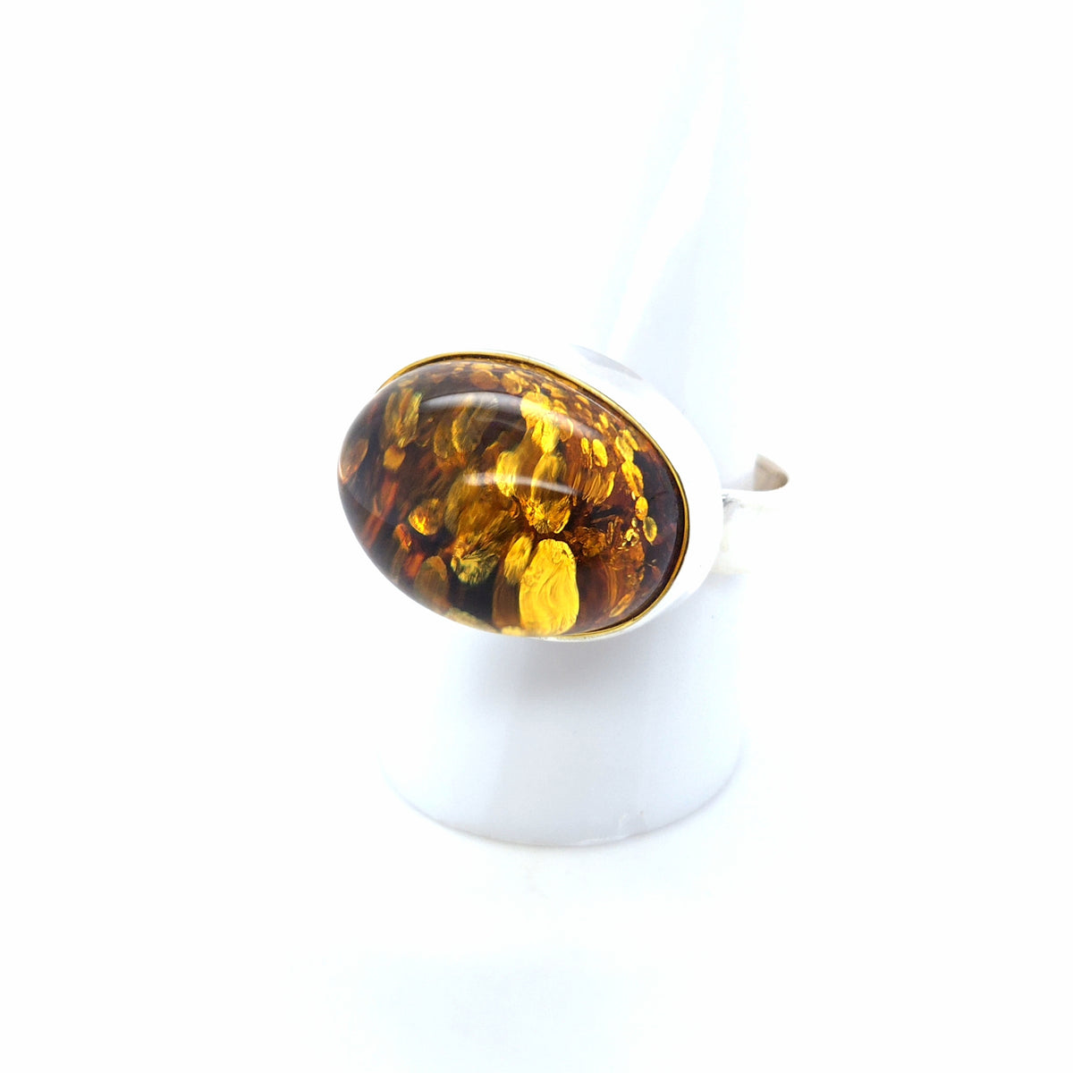 Ring mit honiggelbem Bernstein und Glitzer-Einschlüssen, 925er Silber – verstellbar