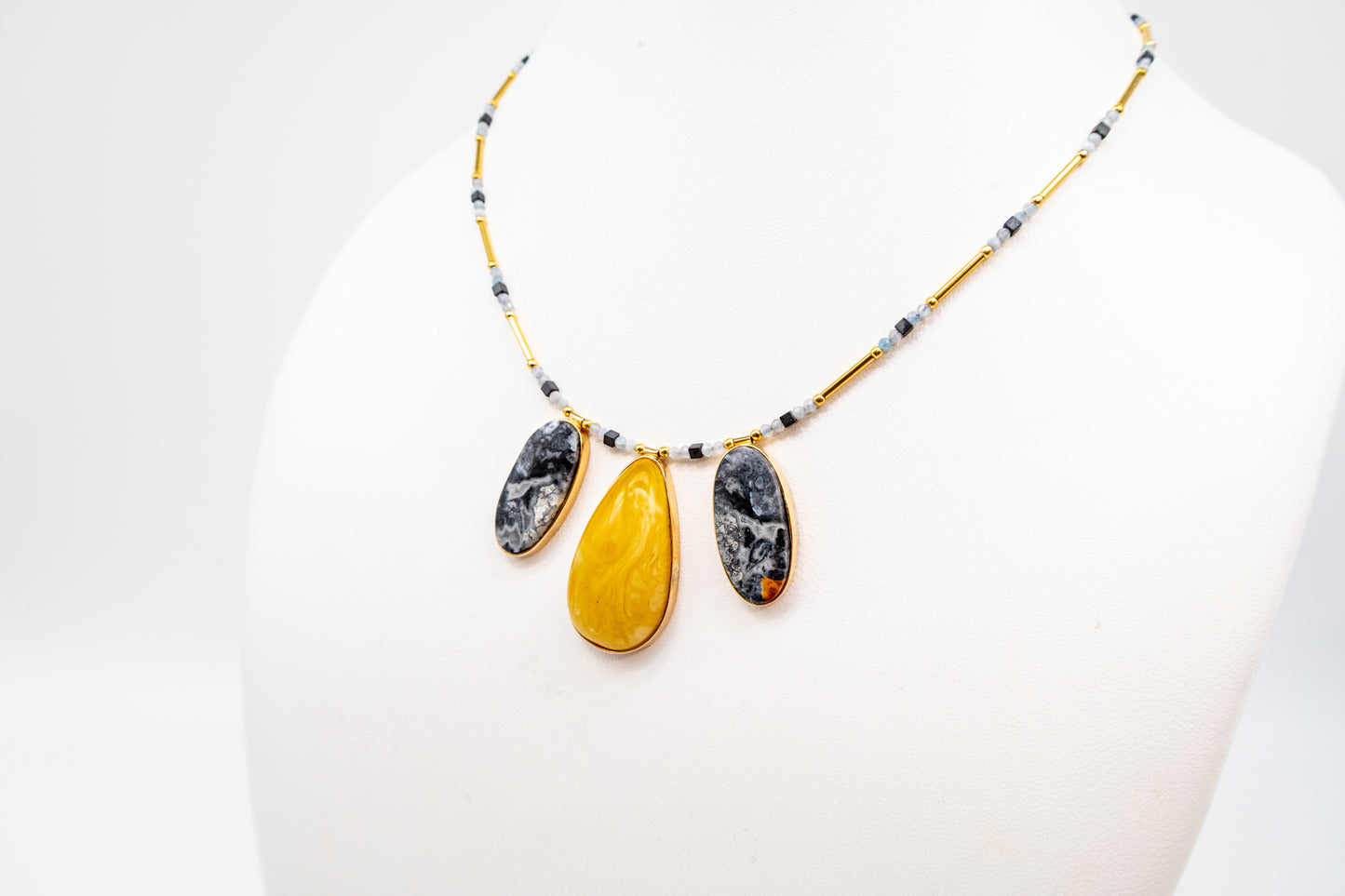 Buy a chic necklace with amber and gemstones