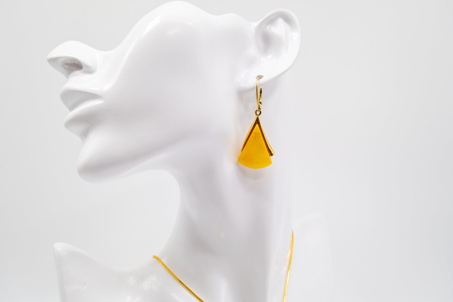 Exclusive gold-plated earrings with genuine amber