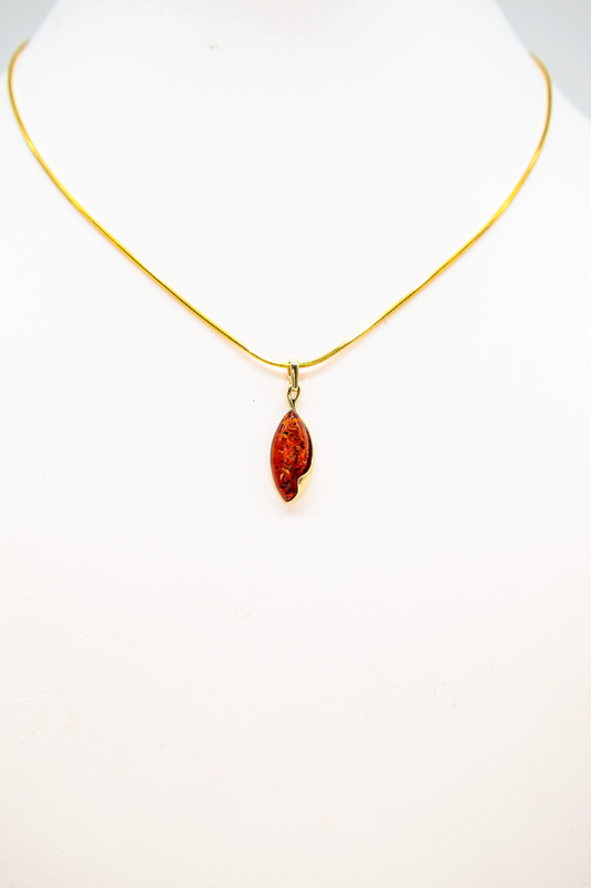Handmade amber pendant – gold-plated design