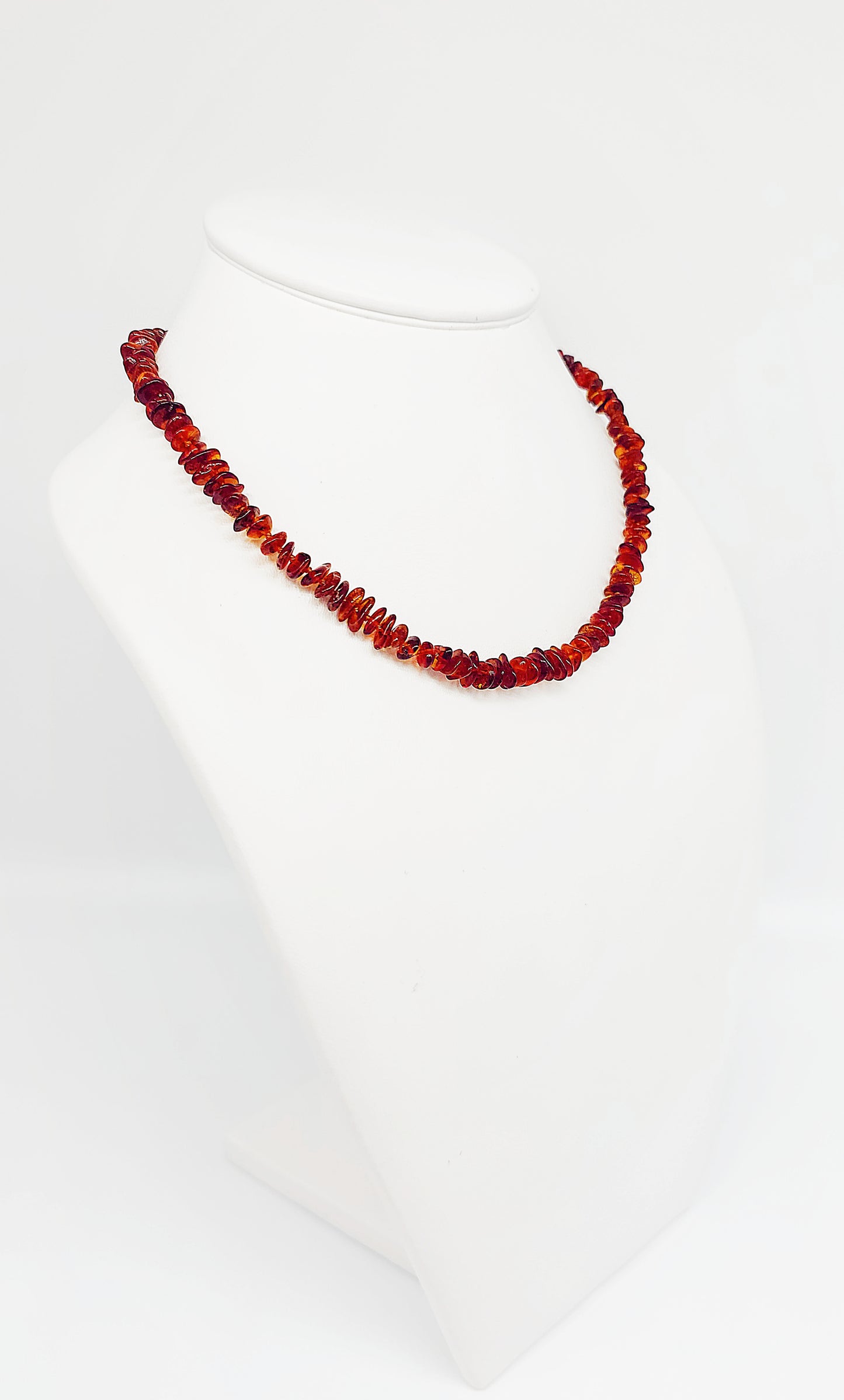 Amber pearl necklace in warm red tones