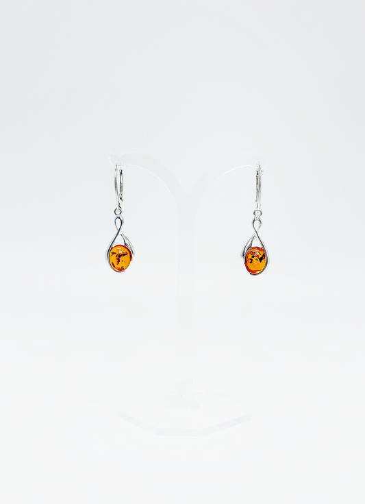 Modern rhombus amber earrings in silver