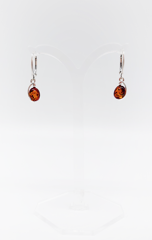 Classic silver and amber earrings in oval shape