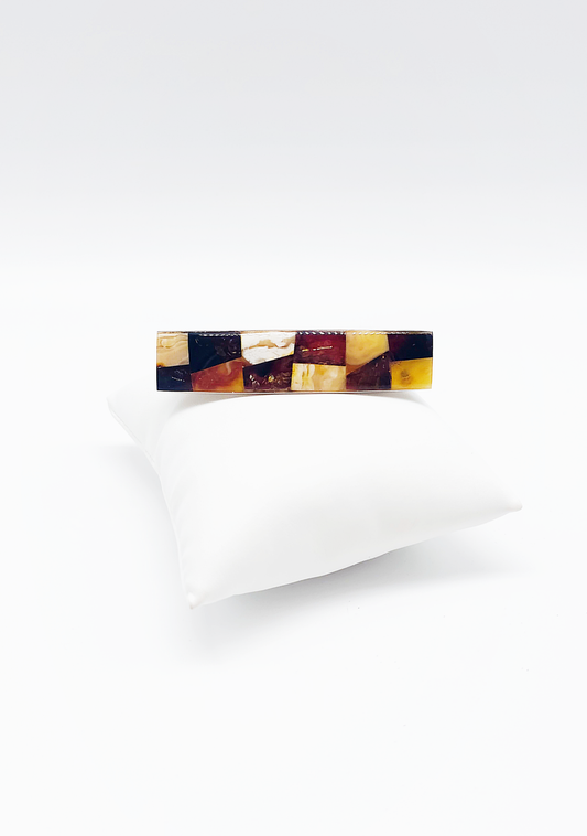 Hair clip made of amber in various shades
