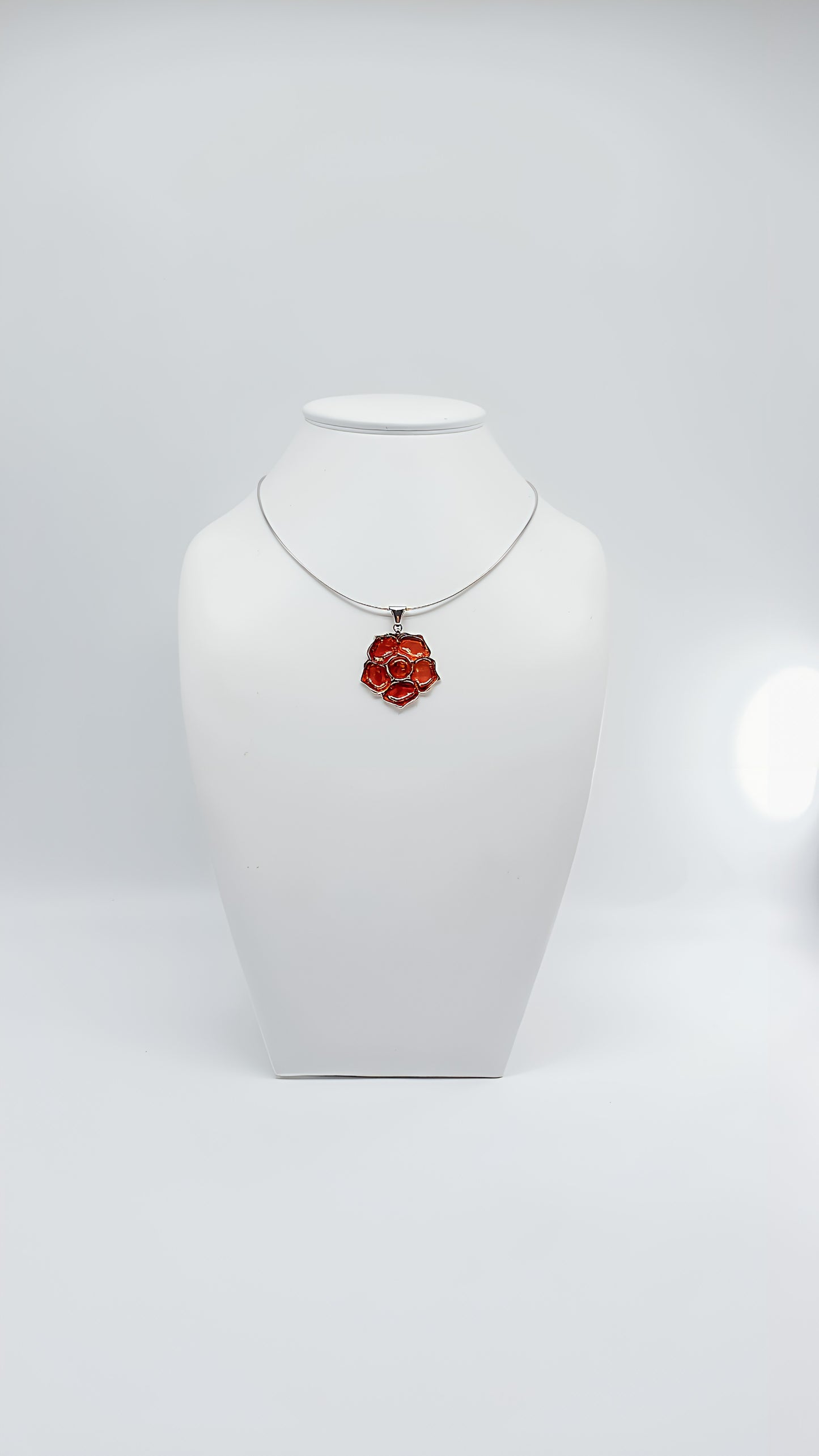 Fiery Blossom: Unique Amber Pendant