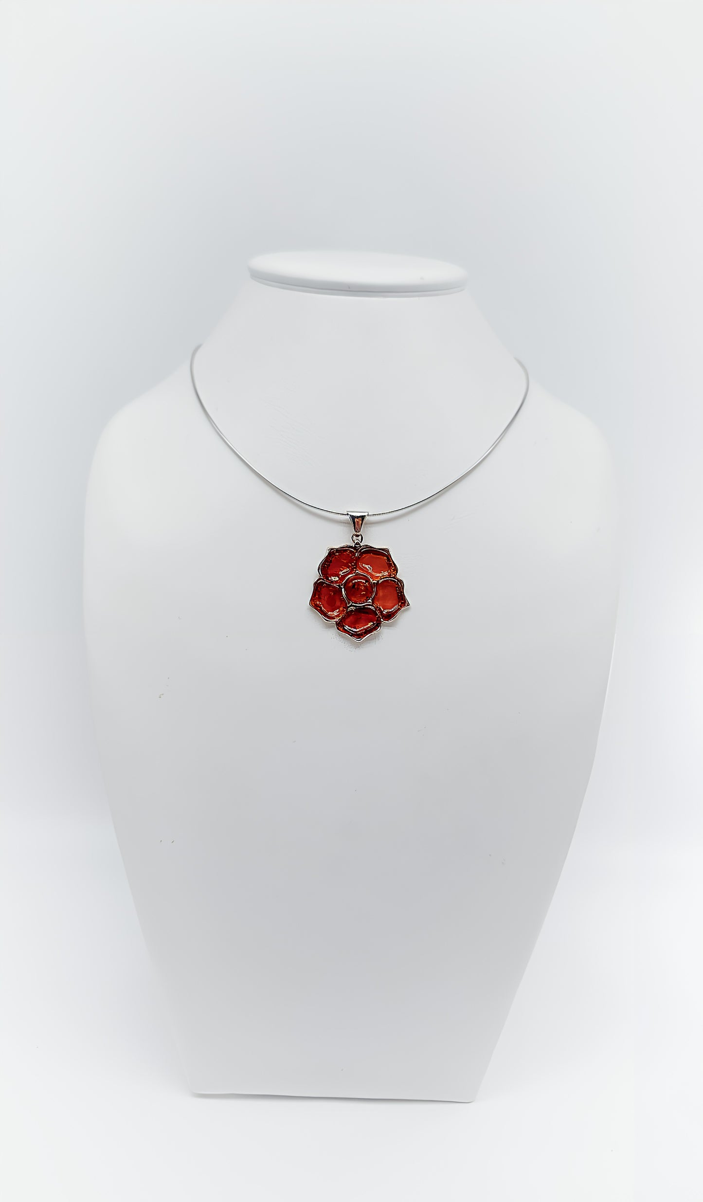 Fiery Blossom: Unique Amber Pendant