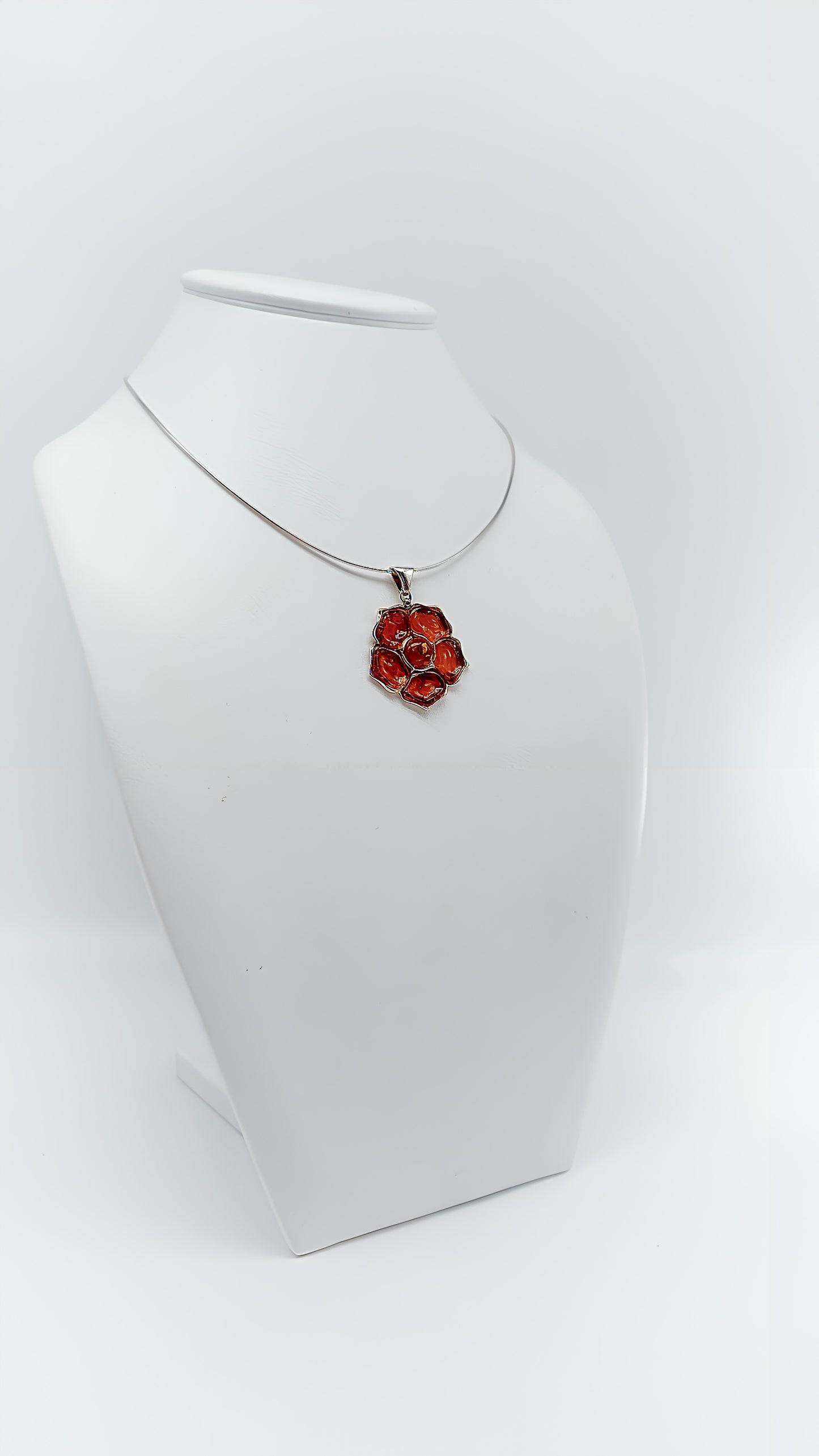 Fiery Blossom: Unique Amber Pendant