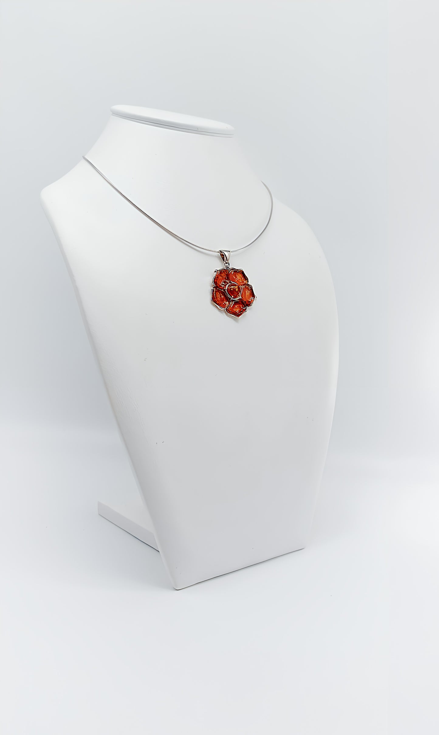 Fiery Blossom: Unique Amber Pendant