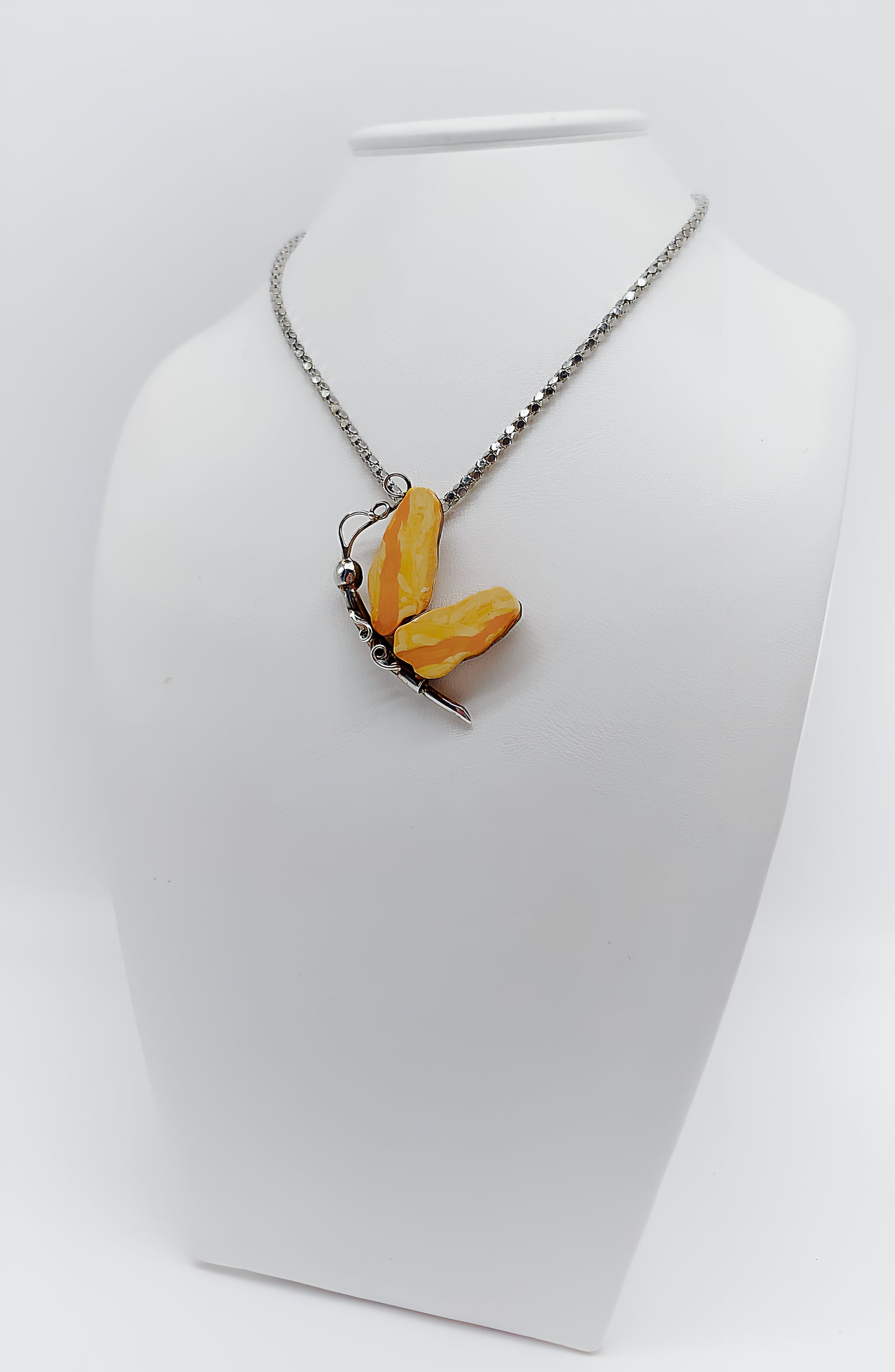 Natural magic: butterfly made of amber and silver