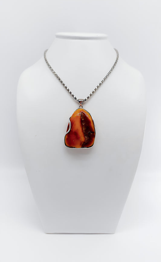 Organic beauty: unique amber pendant
