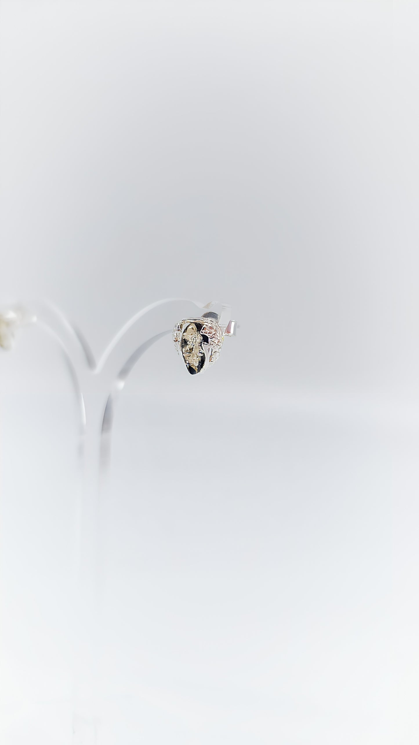 Brilliant drops of silver and amber