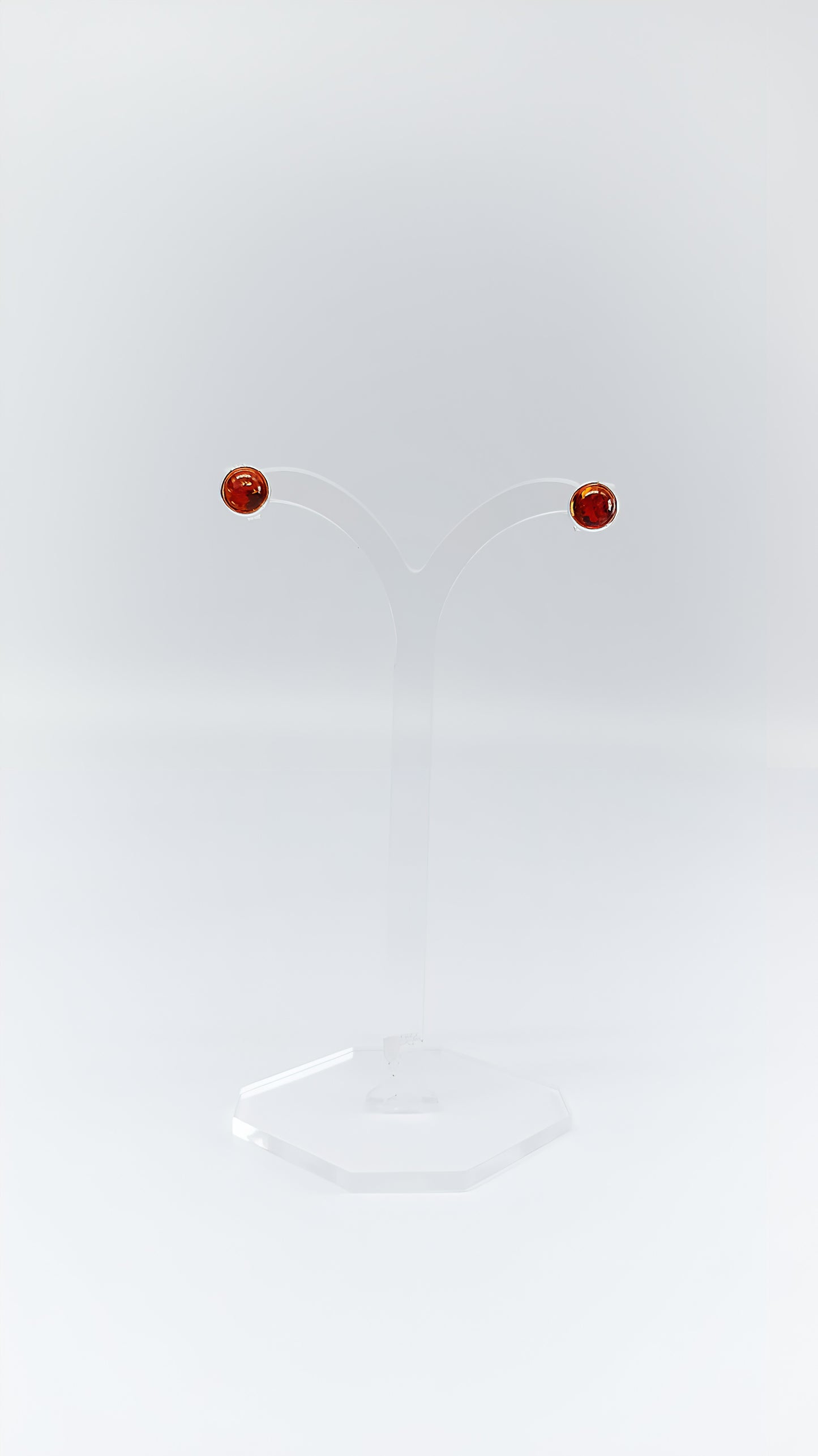 Round perfection: amber earrings in silver