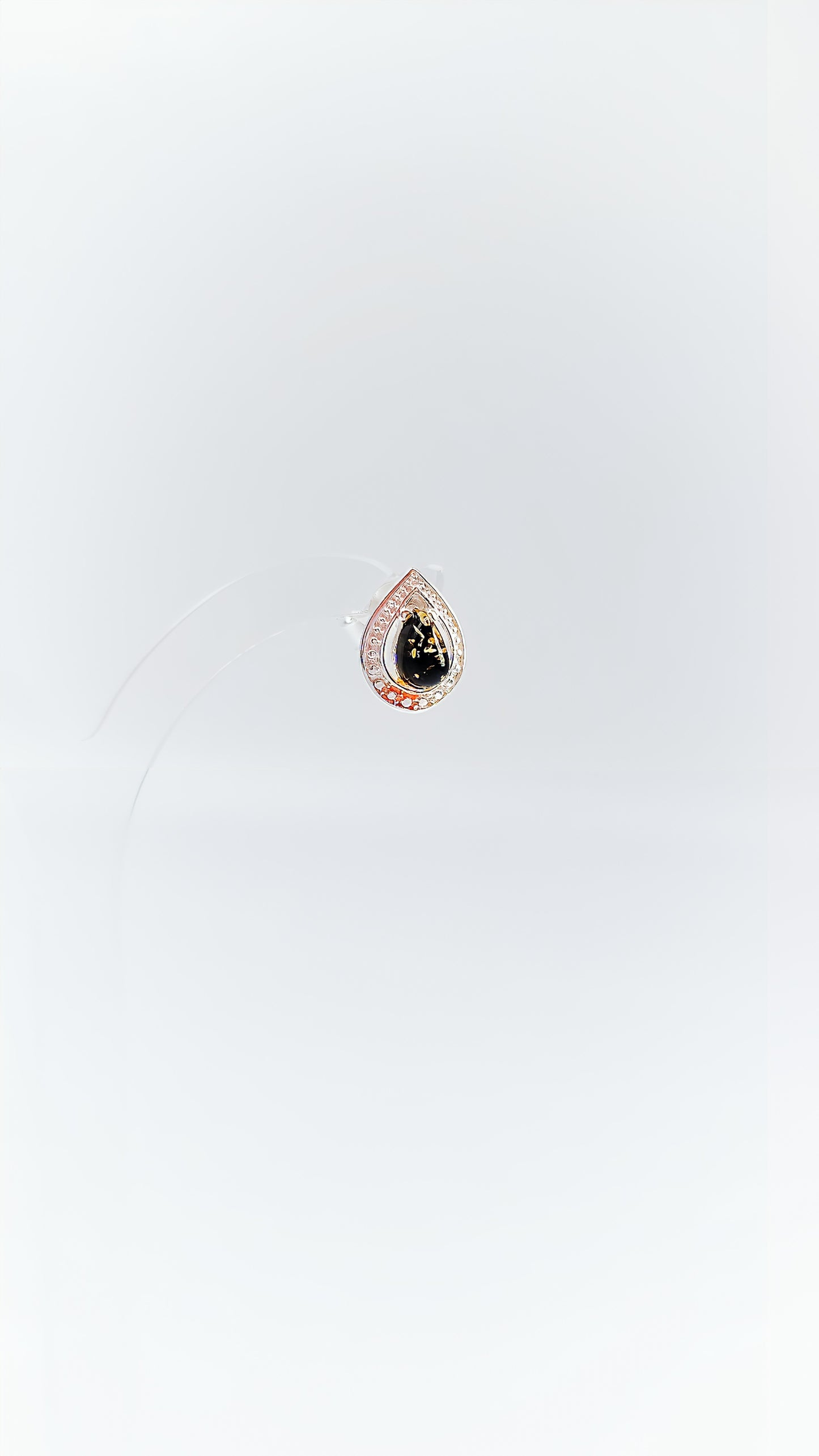 Luxurious drops: Black amber in silver