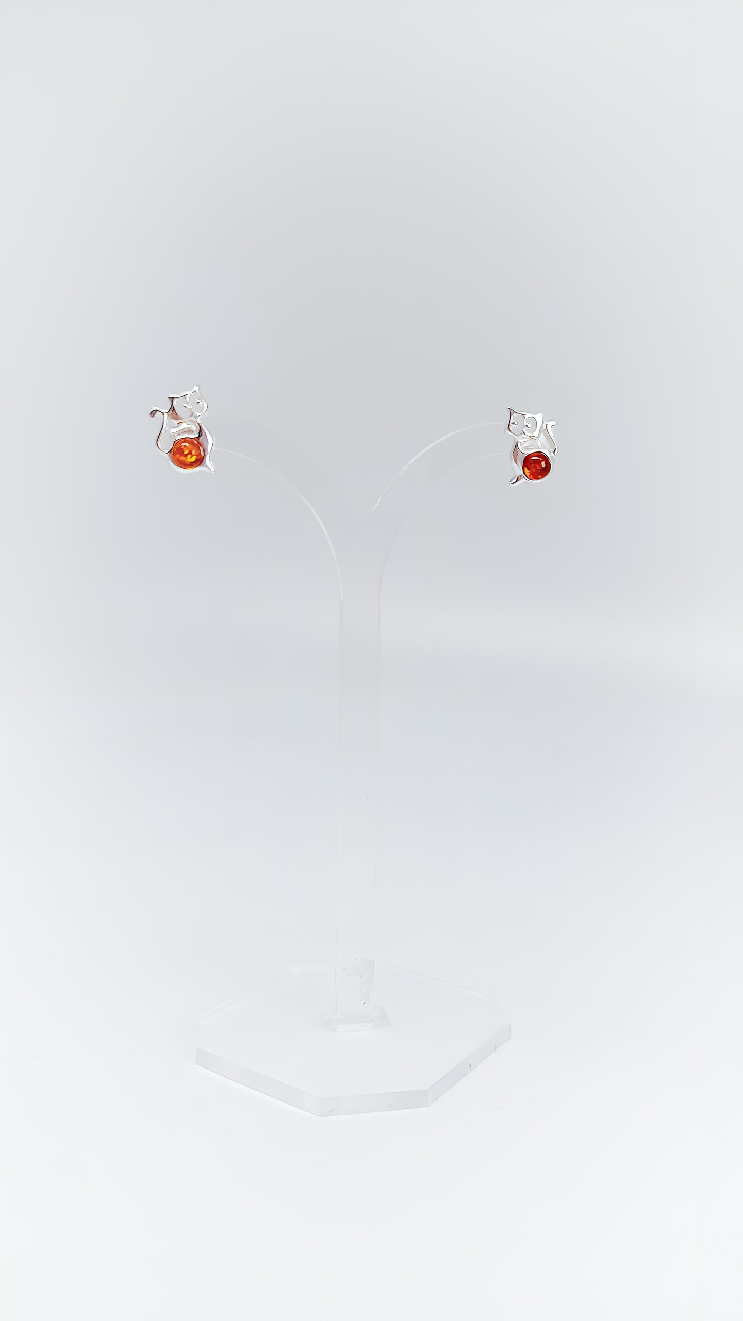 Sweet companion: cat earrings with amber