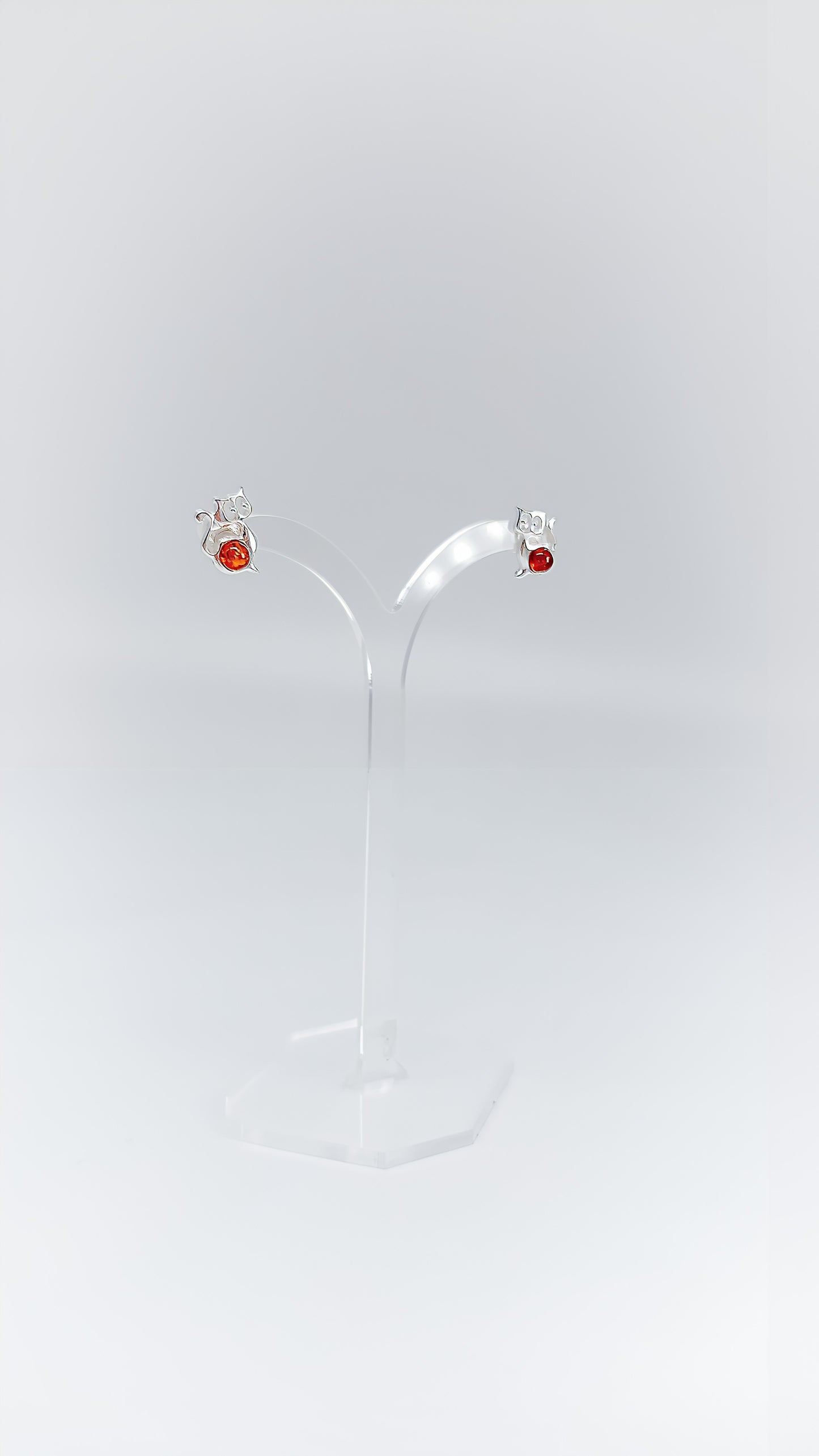 Sweet companion: cat earrings with amber