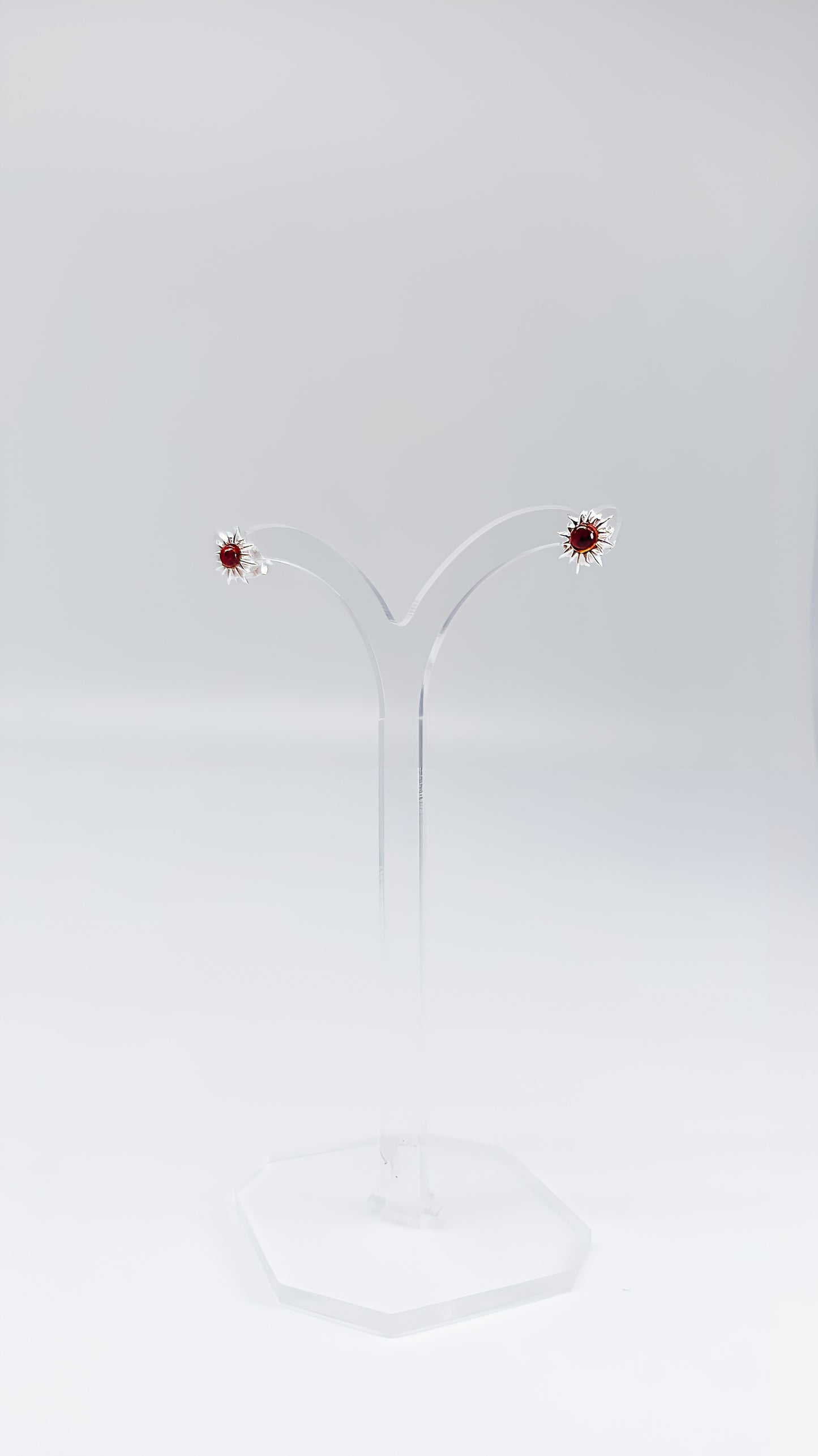 Sunflower flair: stud earrings with charm