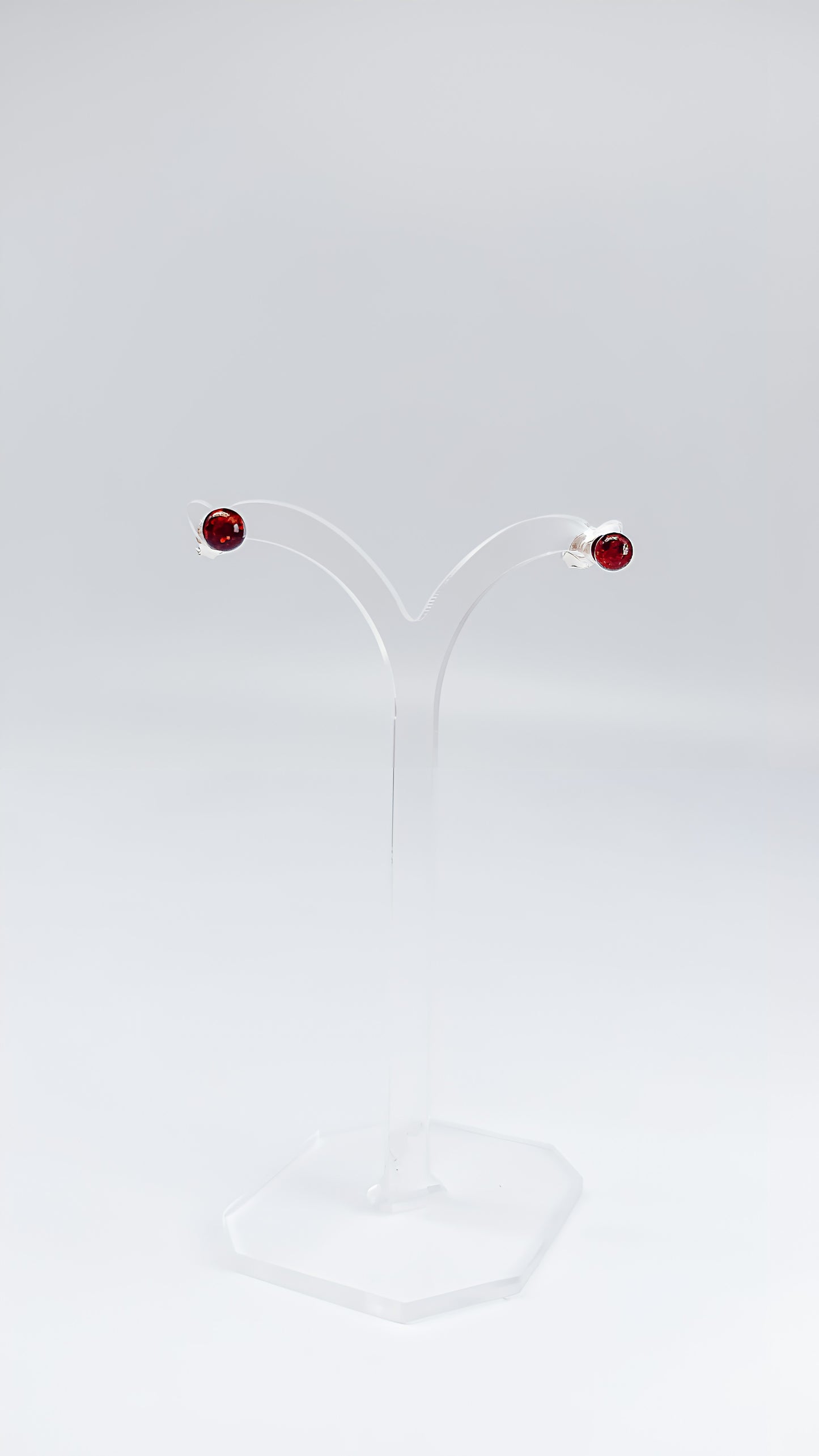Delicate elegance: round amber stud earrings