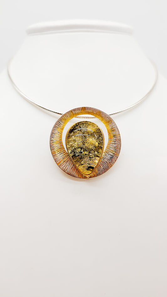 Natural beauty meets design: unique amber pendant