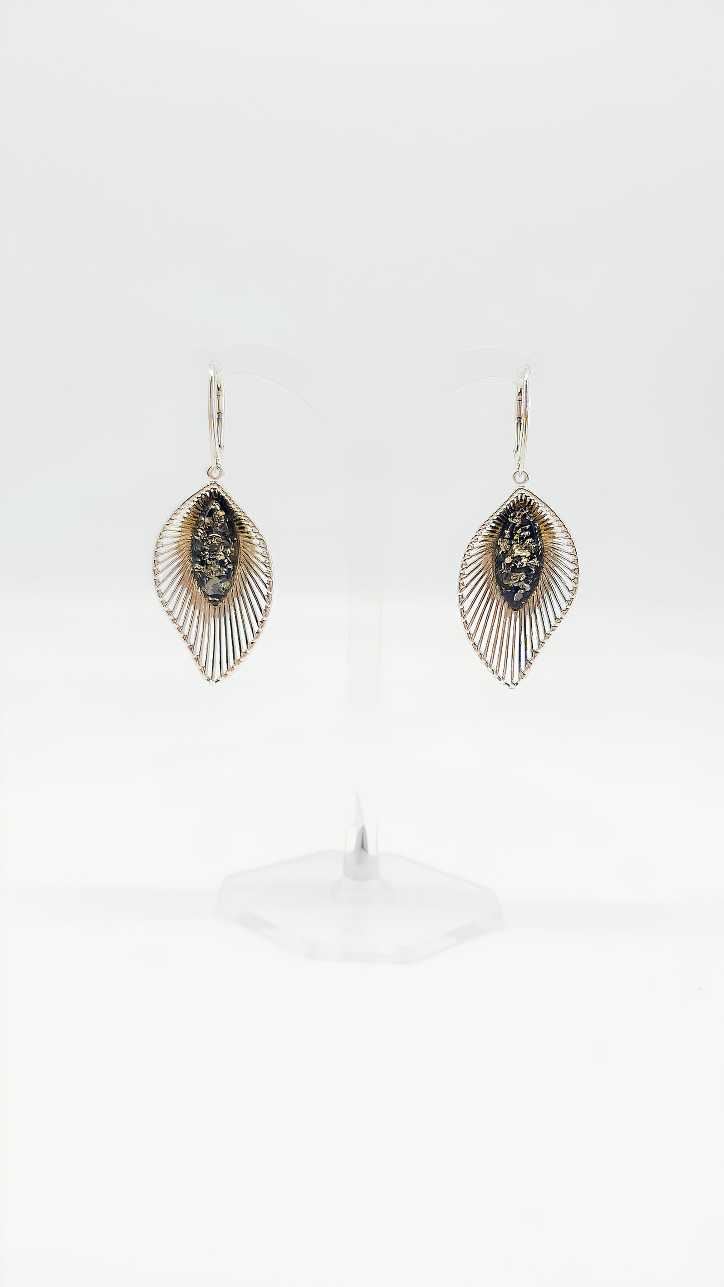 Harmonious design: Silver earrings with amber