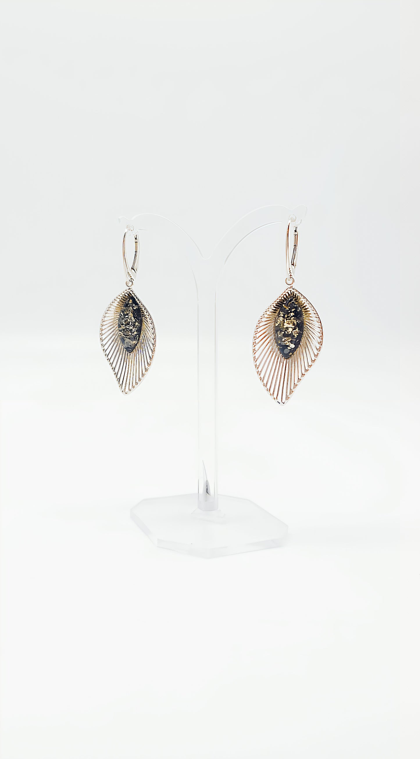 Harmonious design: Silver earrings with amber