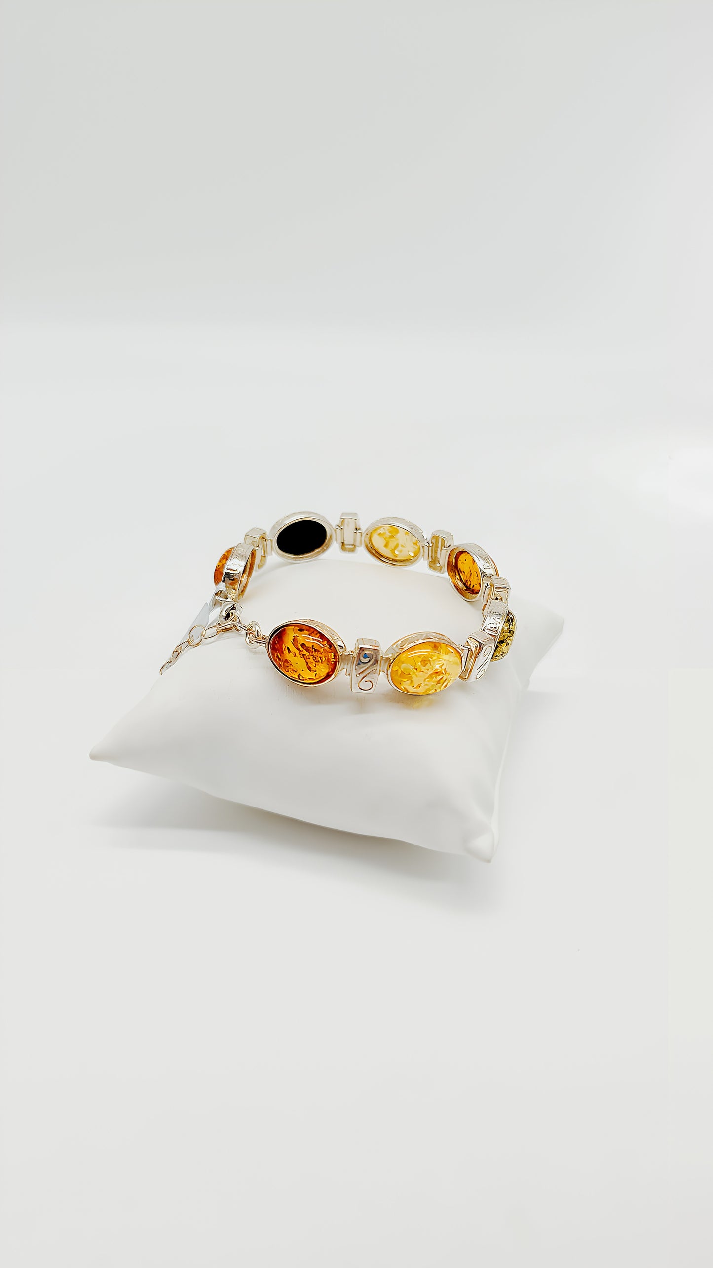 Exklusiver Bernstein: Silberarmband mit bunten Steinen