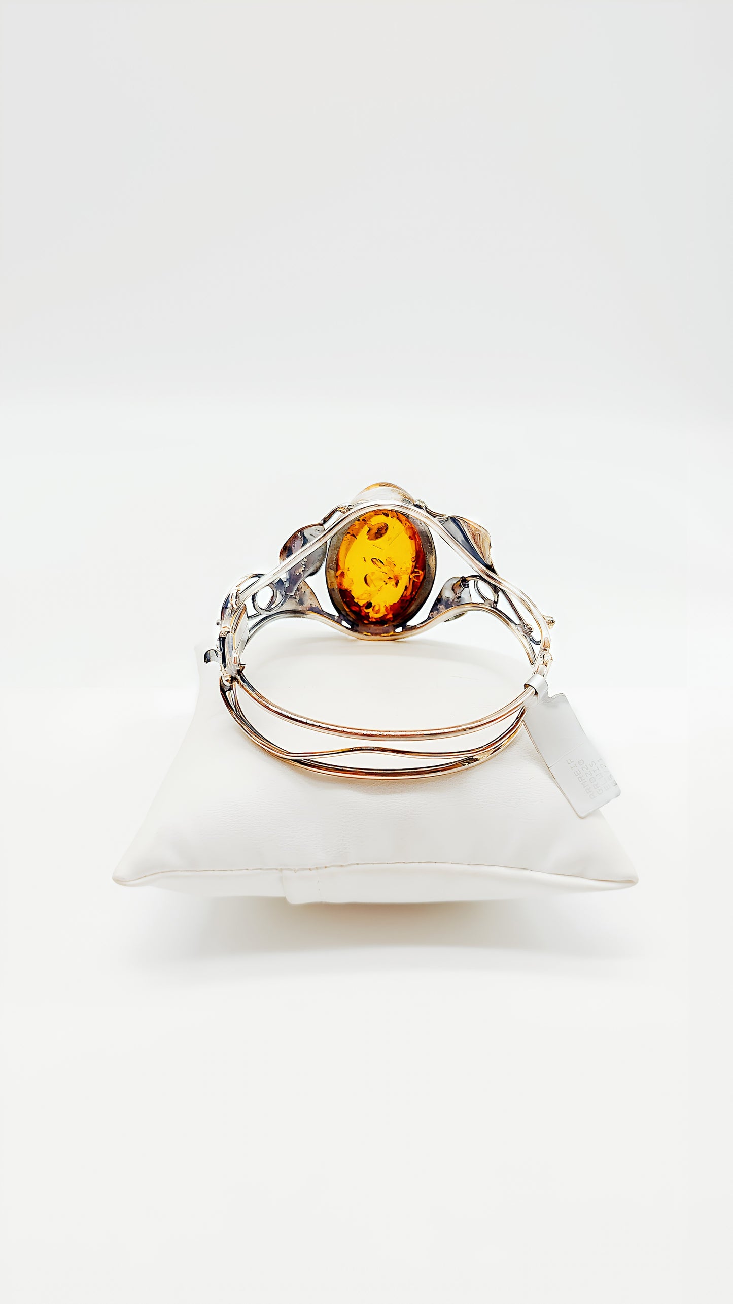 Nature meets elegance: silver and amber bangle