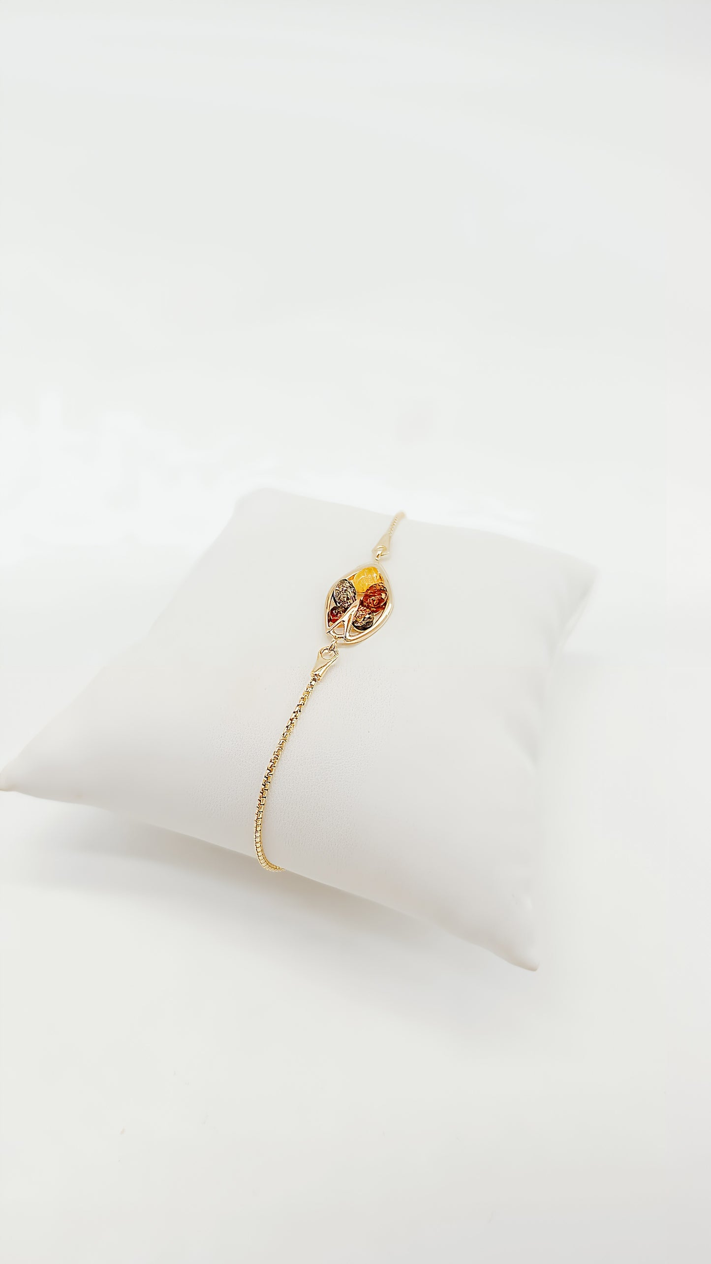 Colorful treasures: amber and gold-plated silver