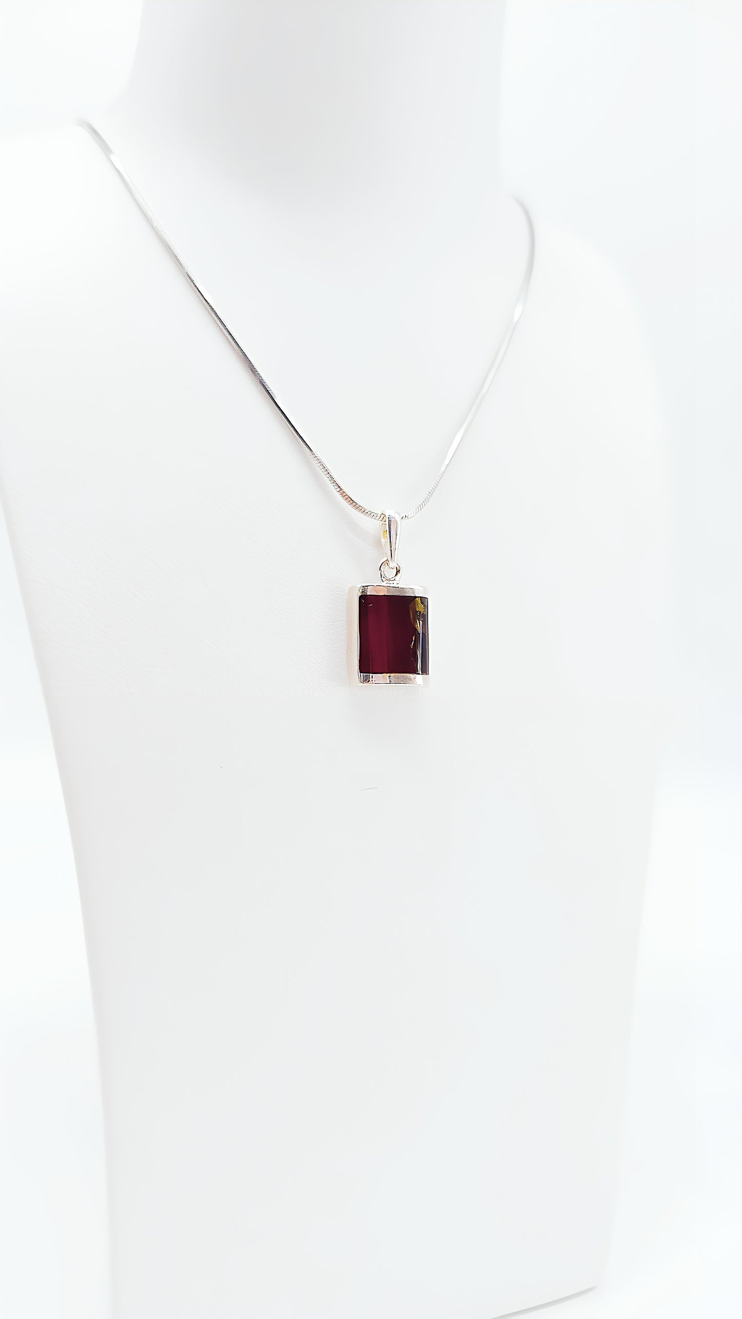 Simple and elegant: rectangular amber pendant