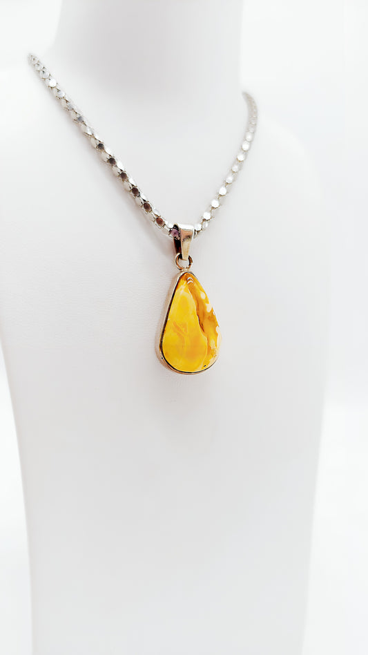 Golden amber in a silver frame – Exclusive pendant