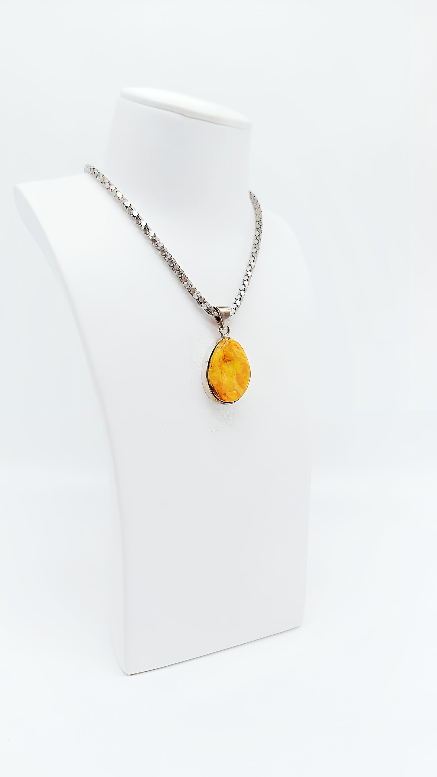 Exclusive unique jewelry – amber pendant in silver