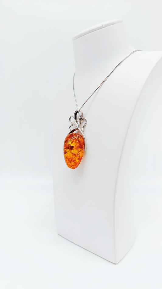 Radiant amber in a filigree design